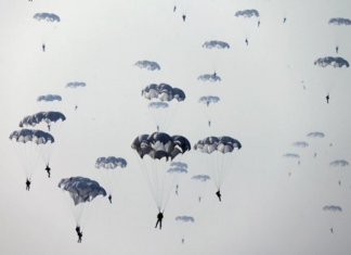 Tragic Parachute Accident Under Kim Jong Un’s Supervision in North Korea North Korea Parachute/KCTV